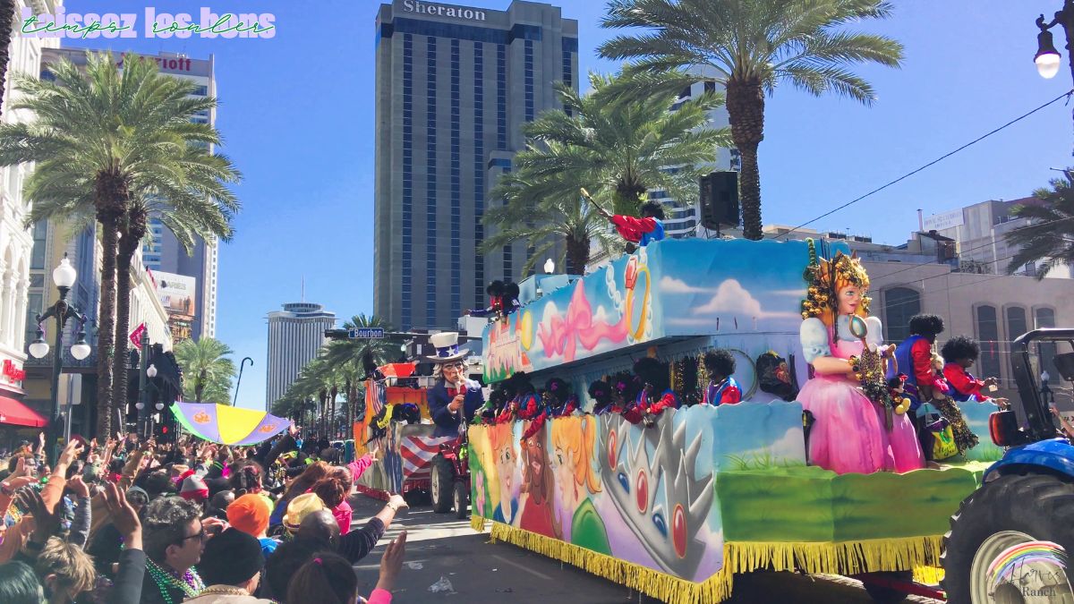 A picture of a Mardi Gras parade with the Sheraton hotel in the background